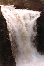 Tetagouche Falls dropping over a rock ledge